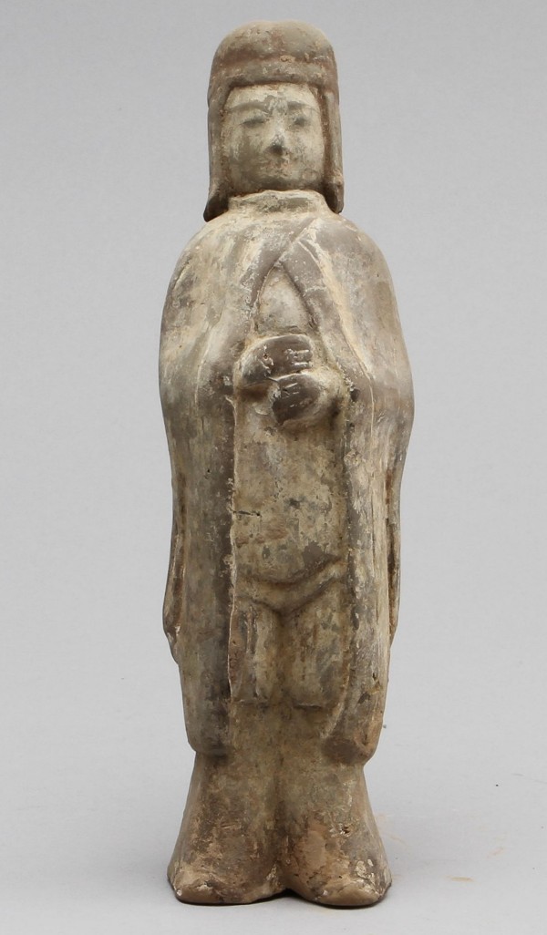 Pottery attendant figure.