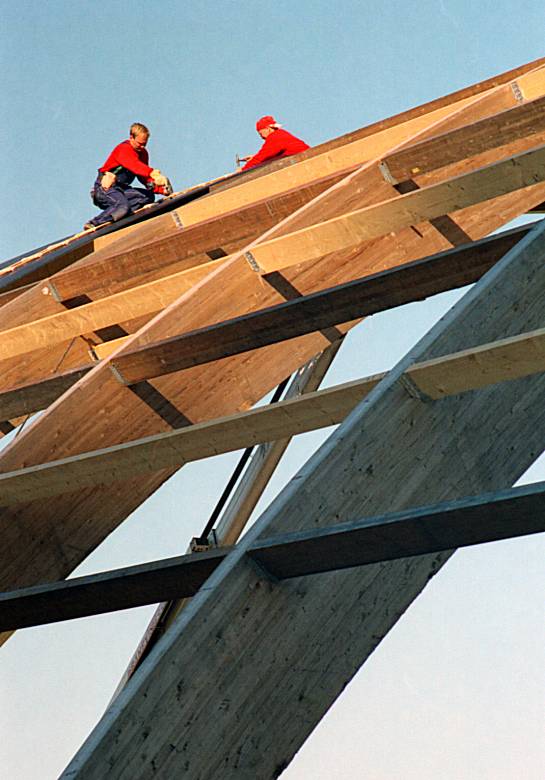 adding tin on the ship hall roof beams